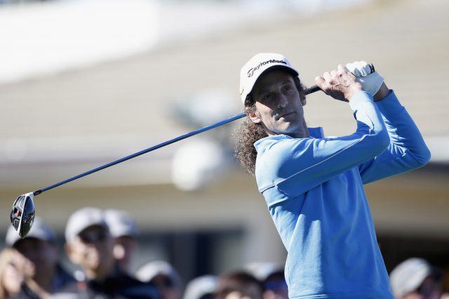 Kenny G tees off on the first hole.