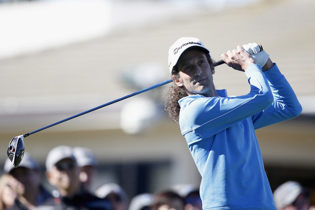 Kenny G tees off on the first hole.