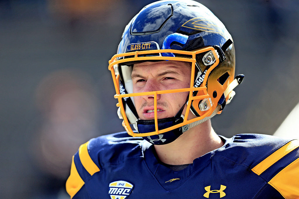 Toledo Rockets quarterback Logan Woodside stands on the sidelines against the Central Michigan Chippewas.