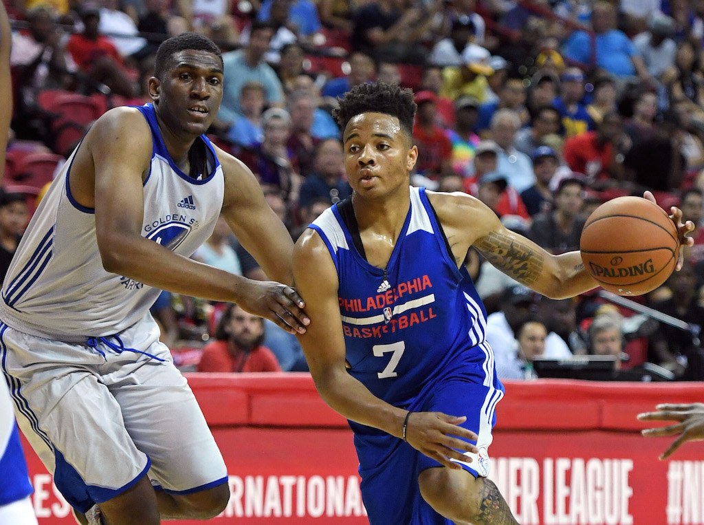 Markelle Fultz gets by the defender. Markelle Fultz drives to the bucket.