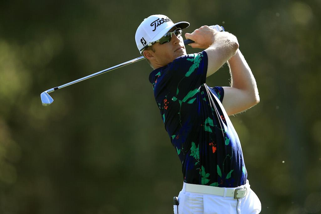 Morgan Hoffmann hits off the tee. Morgan Hoffmann tees off.