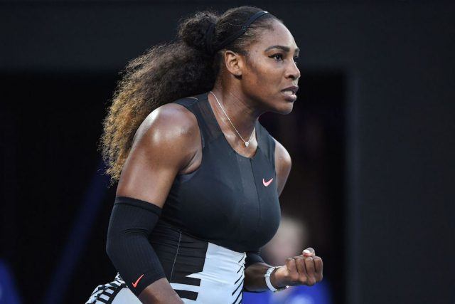 Serena Williams celebrates a winning shot. Serena Williams reacts to winning a point.