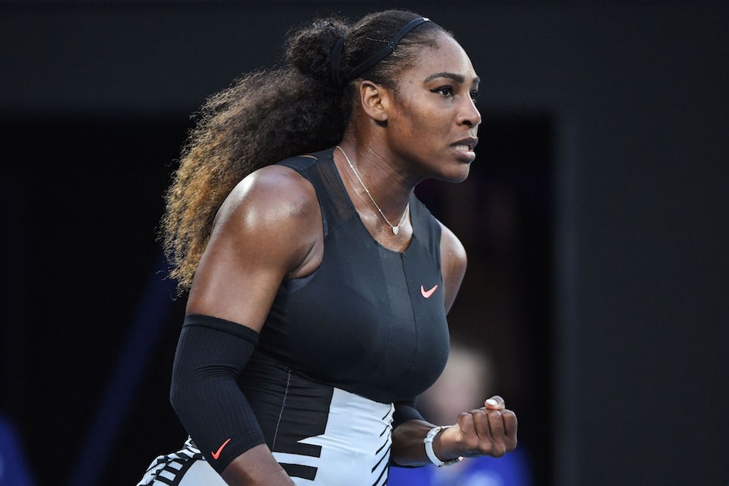 Serena Williams reacts to winning a point.