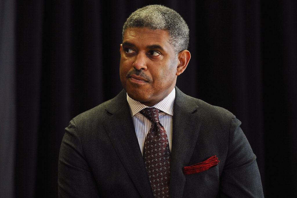 Knicks general manager Steve Mills looks on during a press conference.