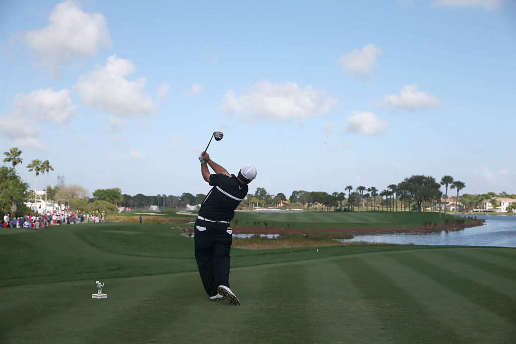 A golf pro plays at PGA National Resort & Spa - Champion Course in Palm Beach Gardens, Florida.