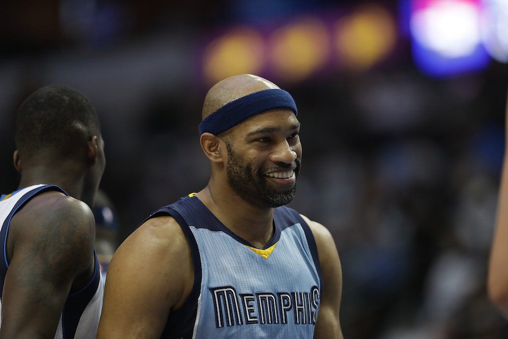 Vince Carter smiles during a game against the Mavs.