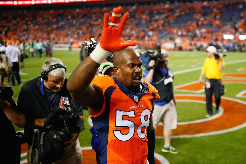 Denver's Von Miller walks off the field. Von Miller celebrates a victory.