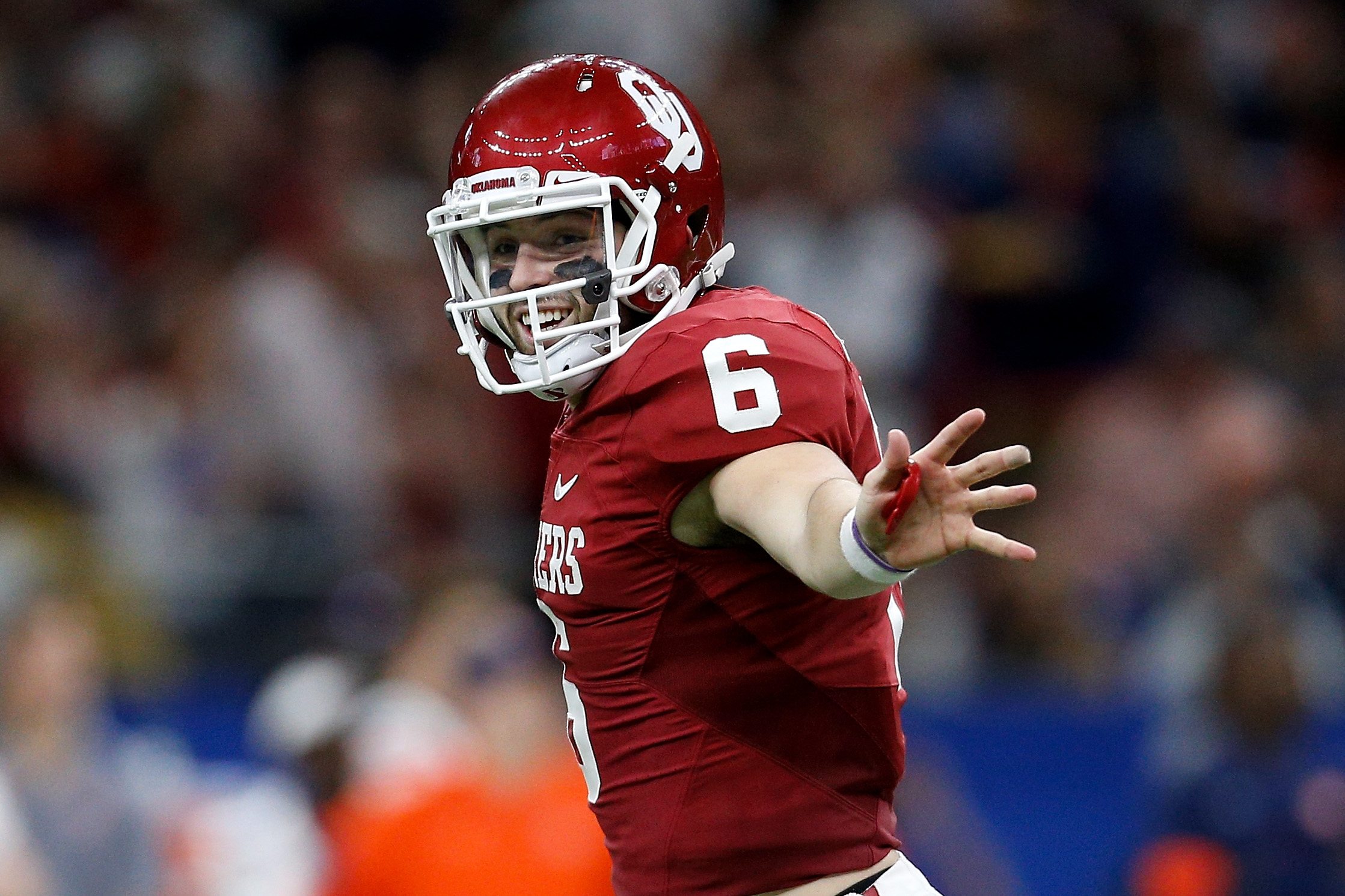 Baker Mayfield takes in the touchdown. Baker Mayfield celebrates a touchdown during the game.