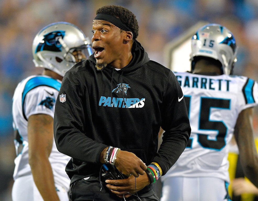 Cam Newton is having fun out there. Cam Newton smiles during the preseason.