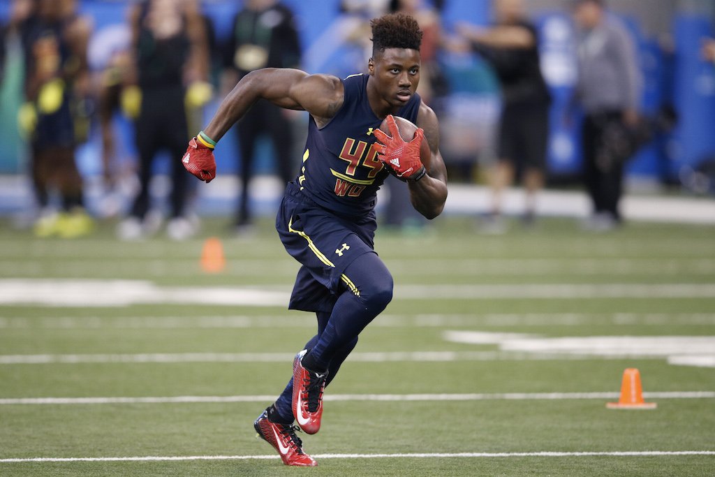 Curtis Samuel runs a drill at the NFL Combine. Curtis Samuel catches a pass during the NFL Combine.