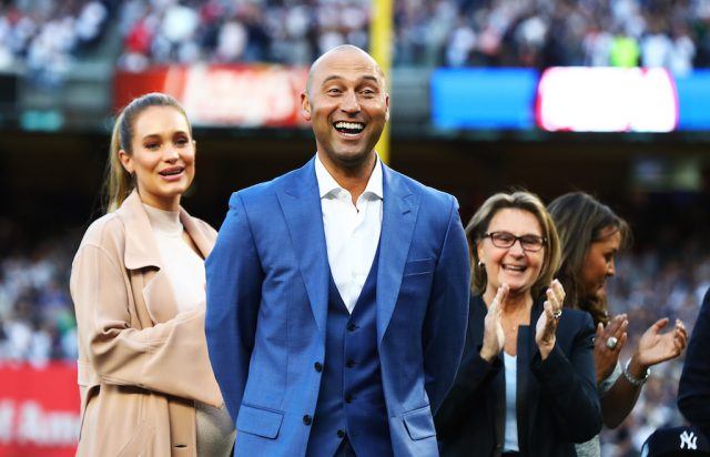 Derek Jeter is a fan favorite. Derek Jeter smiles as the Yankees retire his number.