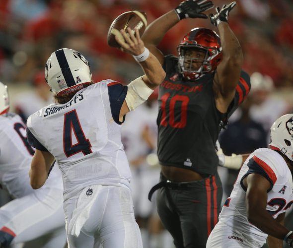 Ed Oliver makes a play. Ed Oliver #10 looks to block a pass.