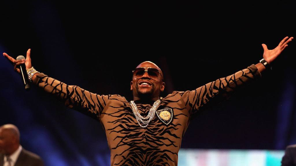 Floyd Mayweather Jr. greets fans at his London press conference.