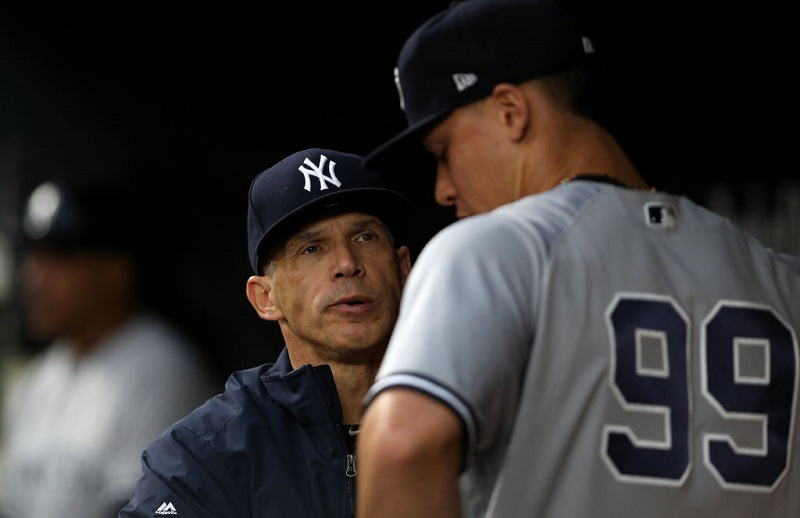 BALTIMORE, MD - MAY 30: Manager Joe Girardi #28 of the New York Yankees (L) talks with Aaron Judge #99 of the New York Yankees before playing the Baltimore Orioles at Oriole Park at Camden Yards on May 30, 2017 in Baltimore, Maryland. 