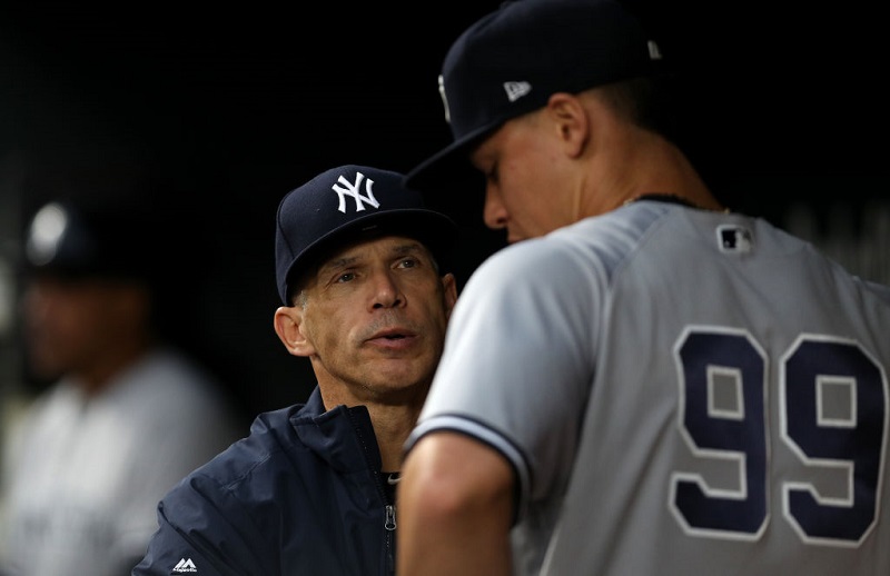 BALTIMORE, MD - MAY 30: Manager Joe Girardi #28 of the New York Yankees (L) talks with Aaron Judge #99 of the New York Yankees before playing the Baltimore Orioles at Oriole Park at Camden Yards on May 30, 2017 in Baltimore, Maryland.