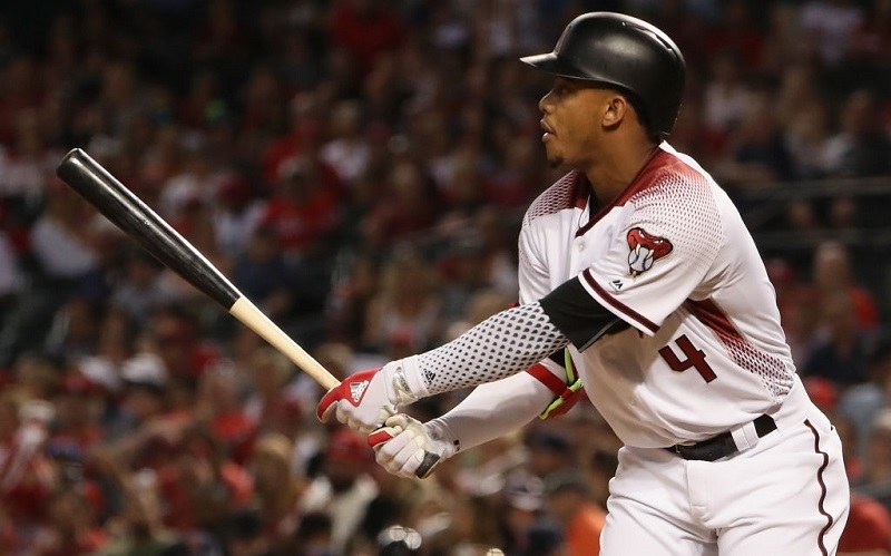 A Diamondbacks batter follows through.