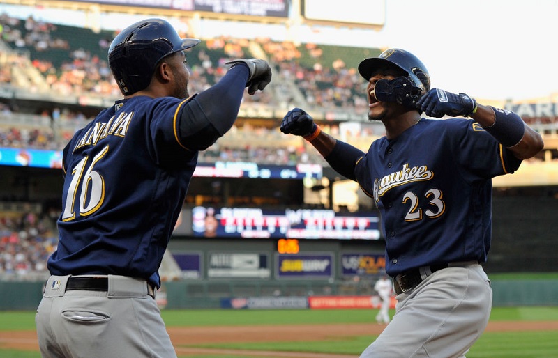 MINNEAPOLIS, MN - AUGUST 07: Domingo Santana #16 of the Milwaukee Brewers congratulates teammate Keon Broxton #23 on a solo home run against the Minnesota Twins during the third inning of the game on August 7, 2017 at Target Field in Minneapolis, Minnesota. 