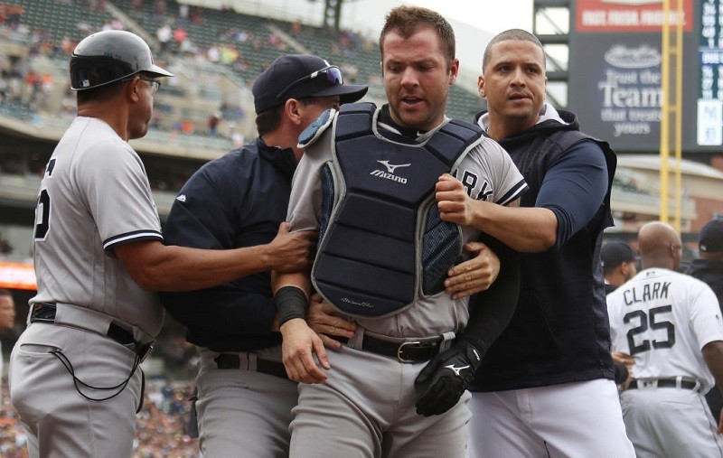 Victor Martinez and Austin Romine during the fight at Comerica Park