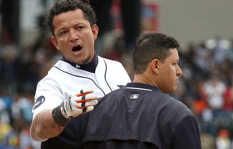 DETROIT, MI - AUGUST 24: Miguel Cabrera #24 of the Detroit Tigers is held back during a sixth inning bench clearing fight with the New York Yankees at Comerica Park on August 24, 2017 in Detroit, Michigan.