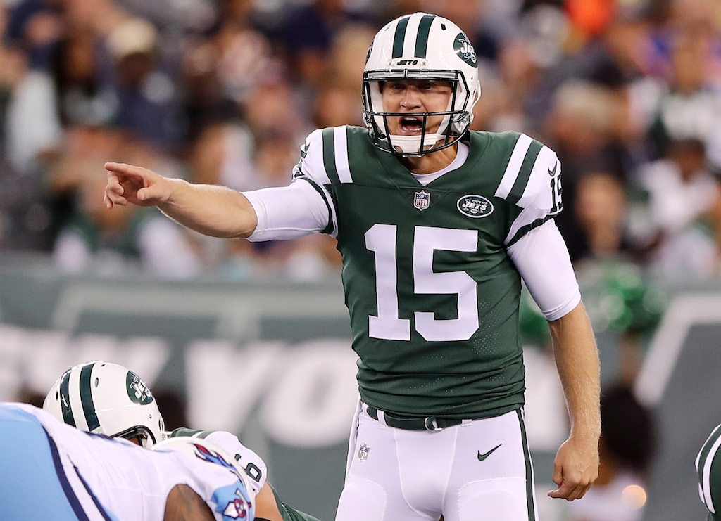 Josh McCown calls a play. Josh McCown makes a call at the line.