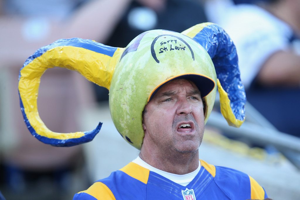 A Rams fan watches the game.