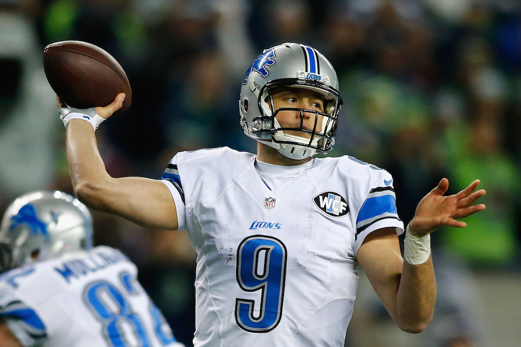 Matthew Stafford looks to throw. Matthew Stafford throws a pass against the Seahawks.
