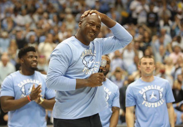Michael Jordan addresses the UNC crowd. Michael Jordan speaks at a North Carolina basketball game.