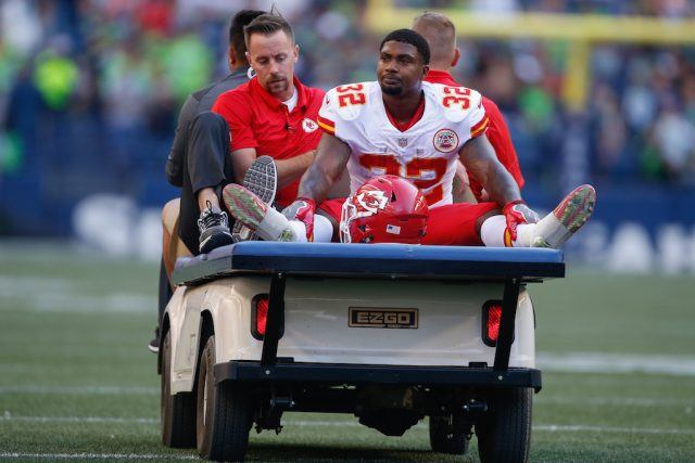 Running back Spencer Ware is carted off the field after an injury. Spencer Ware is carted off the field.