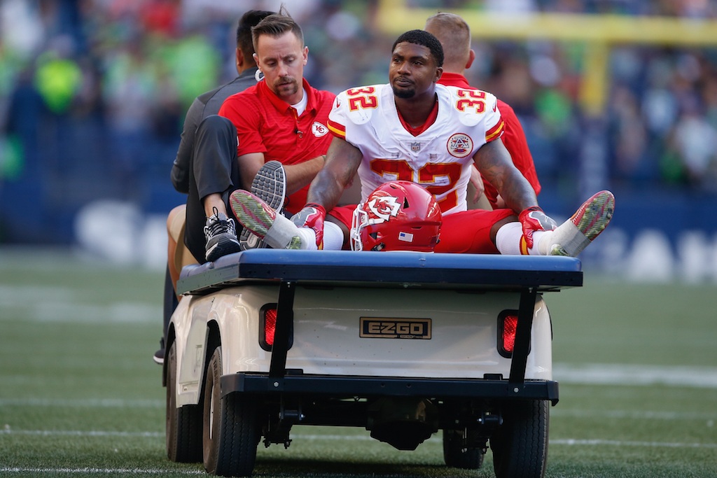 Spencer Ware is carted off the field.
