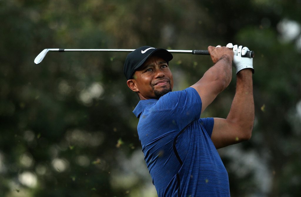 Tiger Woods tees off.