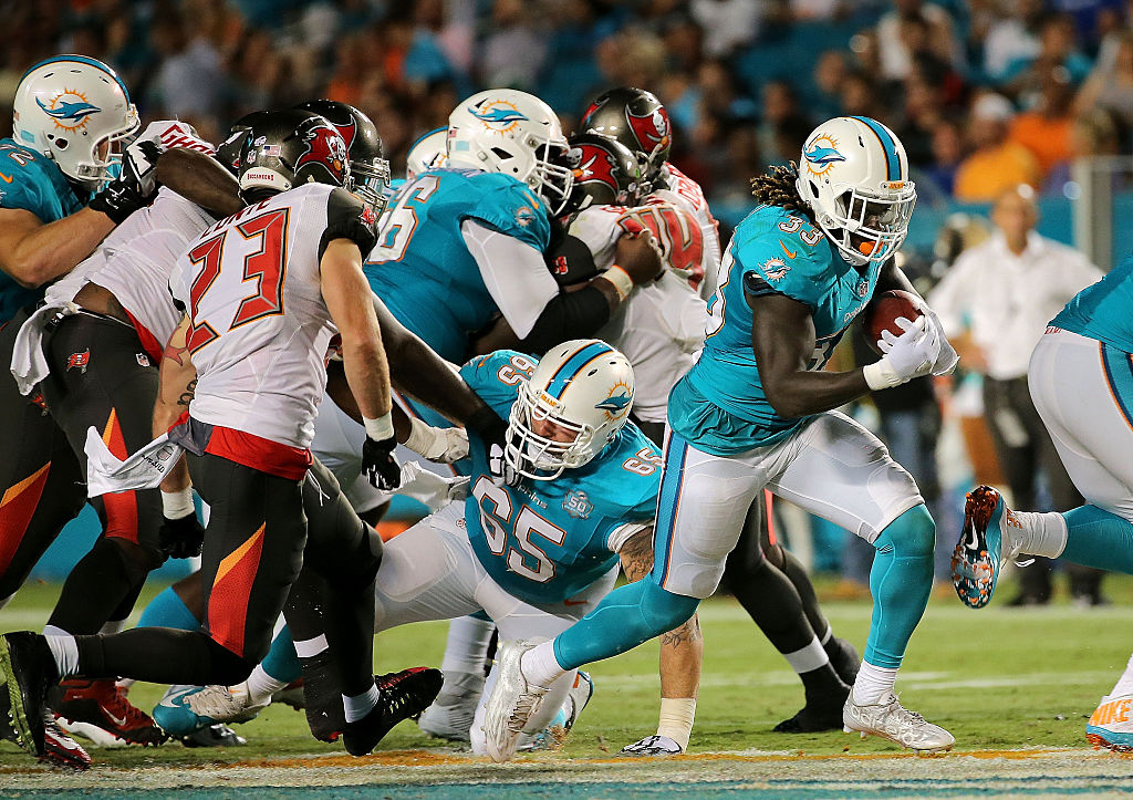 Jay Ajayi rushes during a preseason game