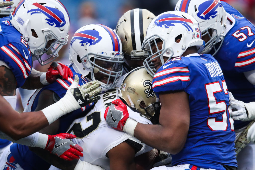 the buffalo bills and saints in a football scrum