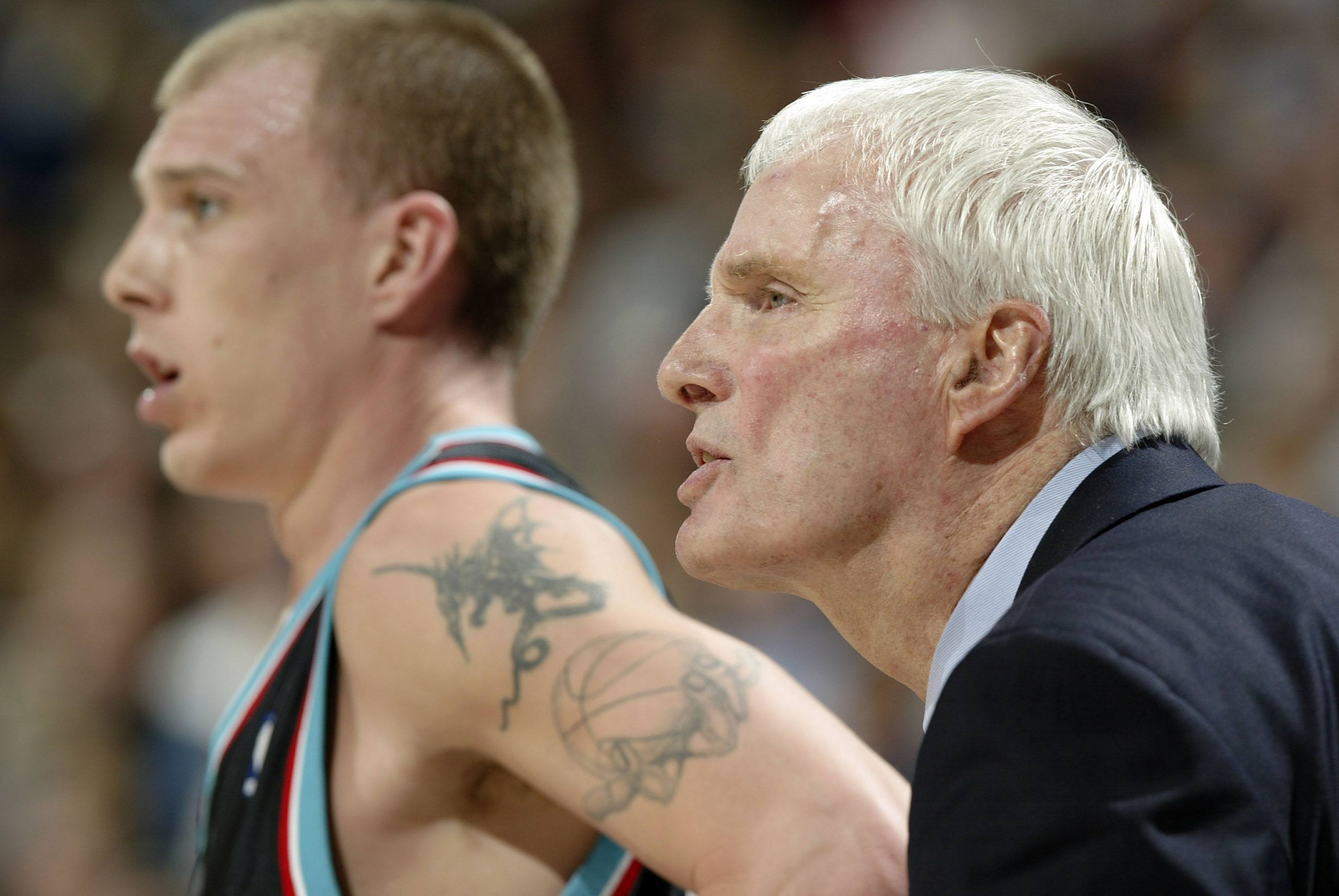 Hubie Brown standing with Jason Williams of the Memphis Grizzlies.