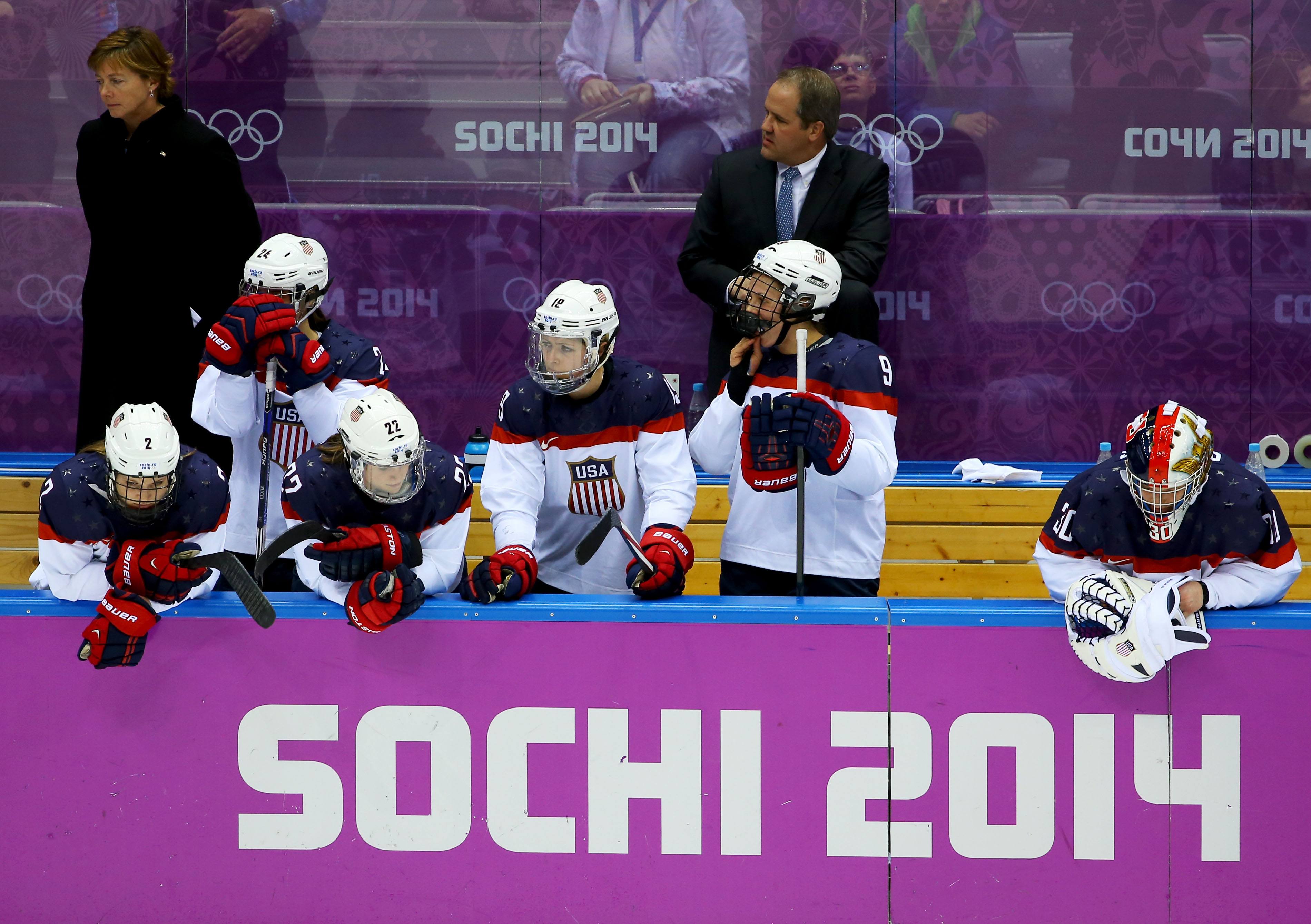 United States players look dejected as Canada win the gold medal during the Ice Hockey Women's Gold Medal Game on day 13 of the Sochi 2014 Winter Olympics at Bolshoy Ice Dome on February 20, 2014 in Sochi, Russia.