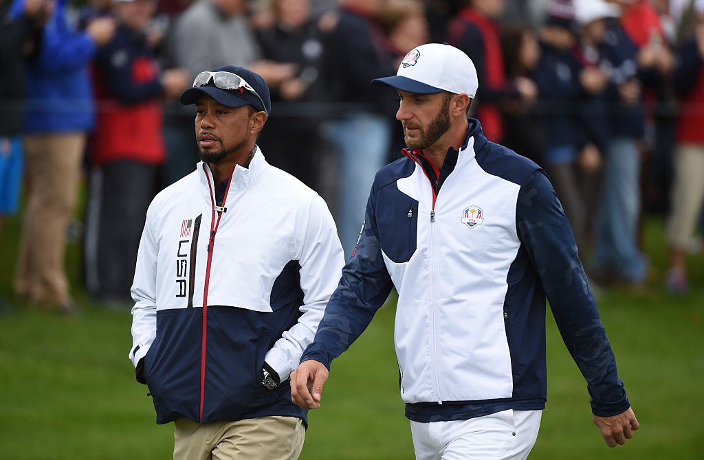 Team USA Dustin Johnson and vice-captain Tiger Woods walk during a practice round ahead of the 41st Ryder Cup at Hazeltine National Golf Course