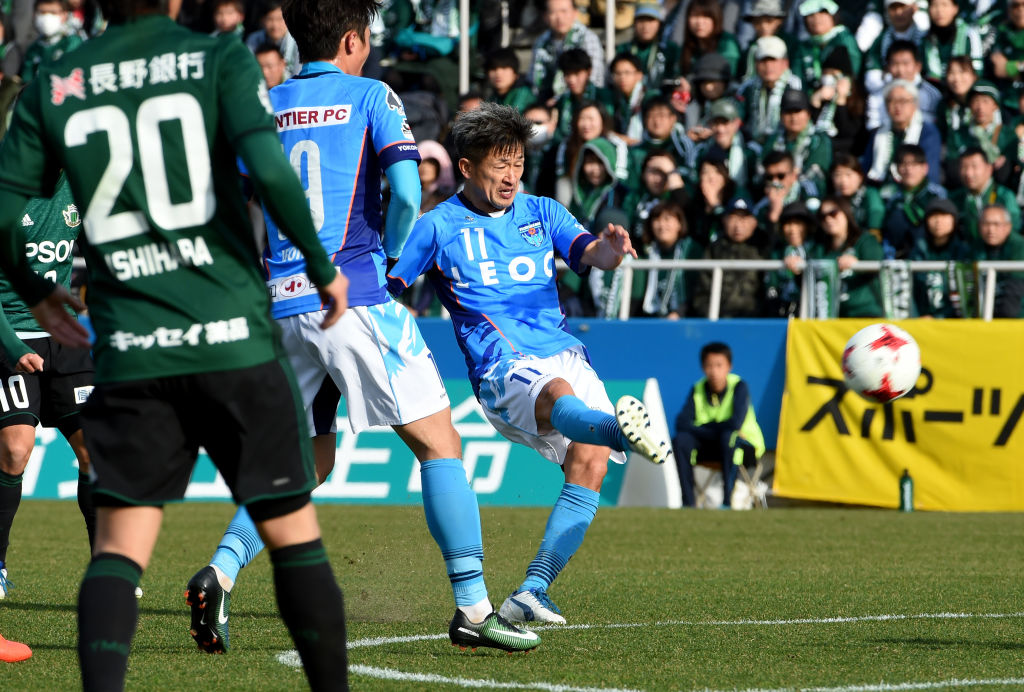 Kazuyoshi Miura takes a shot during a game on his 50th birthda