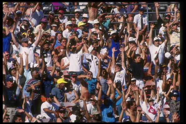 Fans cheer during a game between the Cincinnati Bengals and the San Diego Chargers at Jack Murphy Stadium in San Diego, California. Fans cheer during a game between the Cincinnati Bengals and the San Diego Chargers at Jack Murphy Stadium in San Diego, California.
