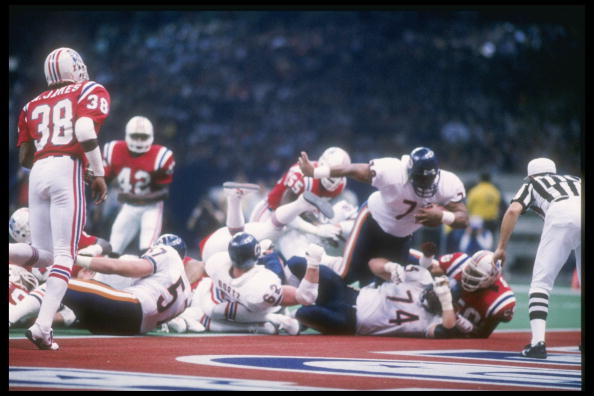 Defensive tackle William Perry #72 of the Chicago Bears dives in for a touchdown during Super Bowl XX against the New England Patriots at the Superdome in New Orleans, Lousiana.