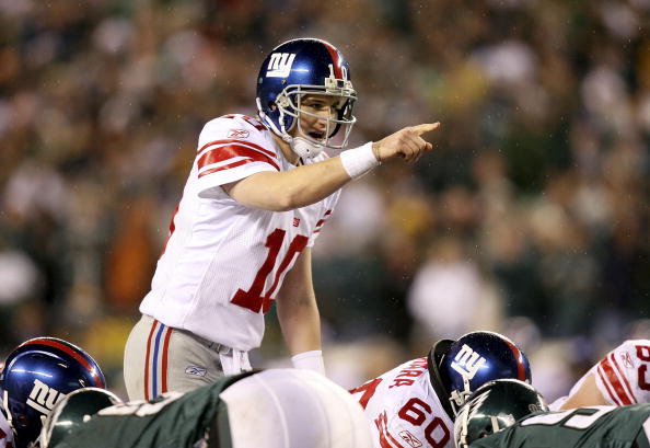 Quarterback Eli Manning of the New York Giants calls a play at the line of scrimmage against the Philadelphia Eagles