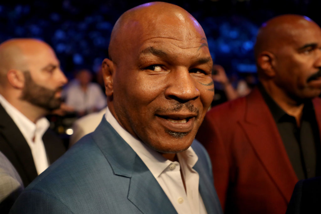 Former boxer Mike Tyson attends the super welterweight boxing match between Floyd Mayweather Jr. and Conor McGregor Former boxer Mike Tyson attends the super welterweight boxing match between Floyd Mayweather Jr. and Conor McGregor