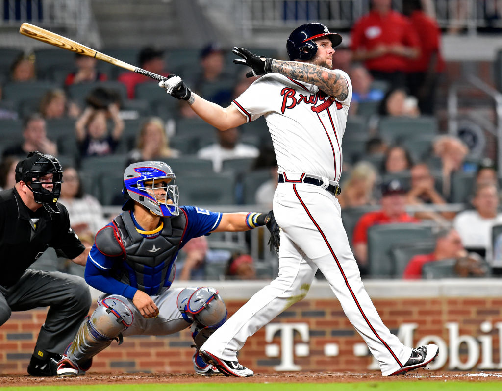 Matt Adams of the Atlanta Braves hits a two-run homer.