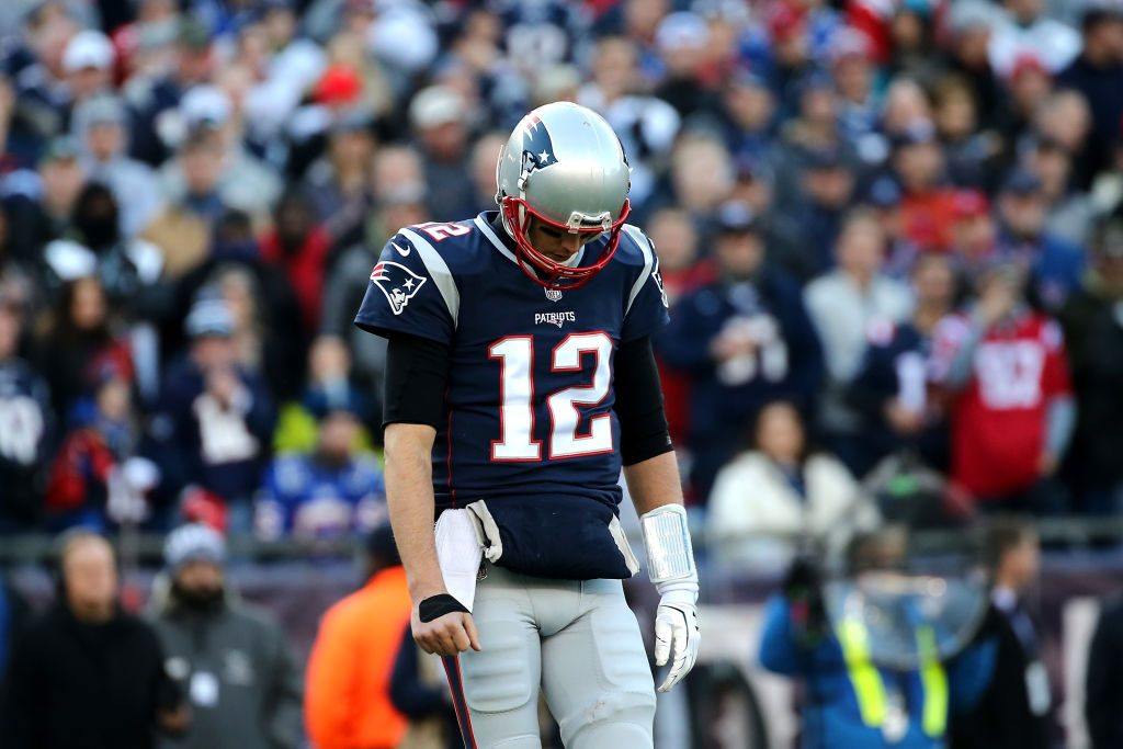 Tom Brady looking unhappy on the field Tom Brady looking unhappy on the field