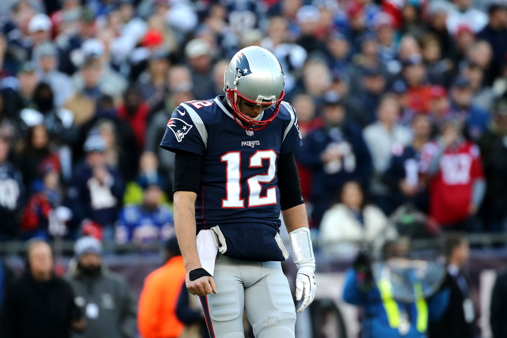 Tom Brady looking unhappy on the field Tom Brady looking unhappy on the field