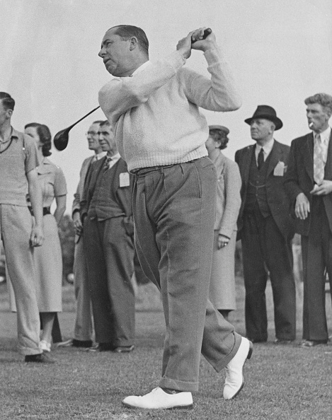 Walter Hagen swinging a club