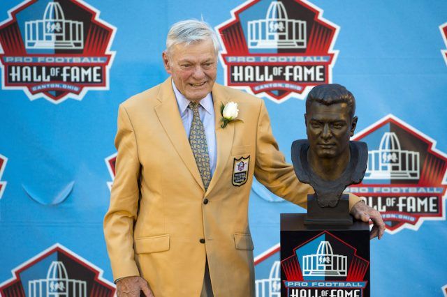 Jack Butler Former Pittsburgh Steelers cornerback with his bust during the Class of 2012 Pro Football Hall of Fame Enshrinement Ceremony