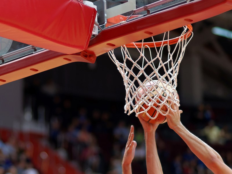 A player catching the ball at a game. A player catching the ball at a game.