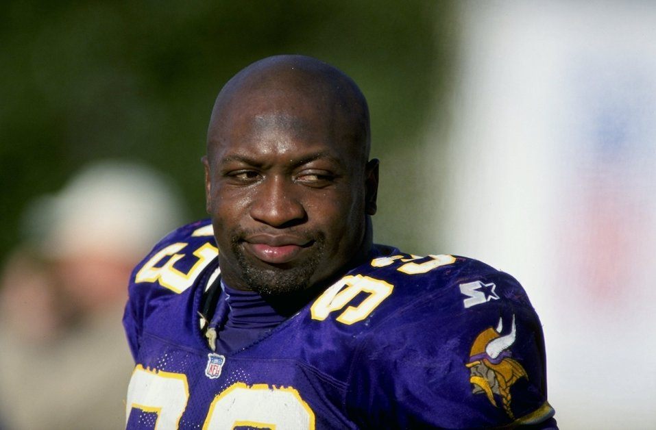 Defensive tackle John Randle #93 of the Minnesota Vikings looks on during the game
