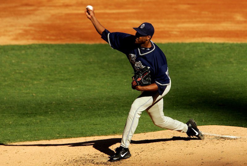 Pedro Astacio throwing a baseball on the field. Pedro Astacio throwing a baseball on the field.