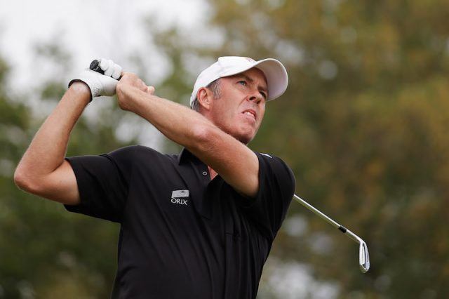 Richard Green aiming his golf club. Richard Green aiming his golf club.