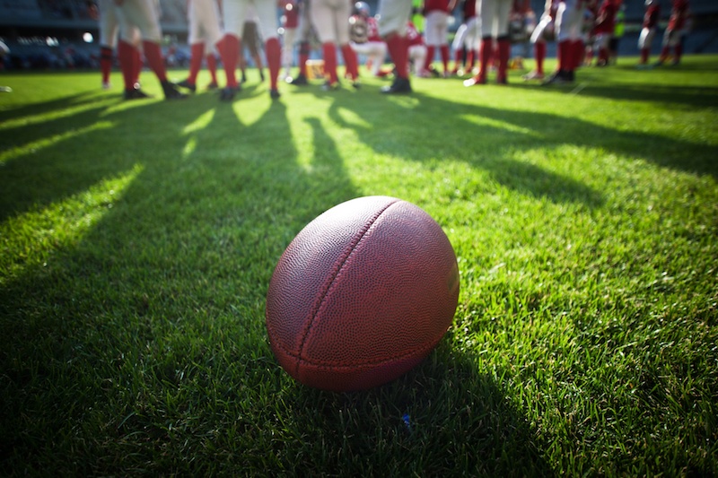 A football on the field. A football on the field.